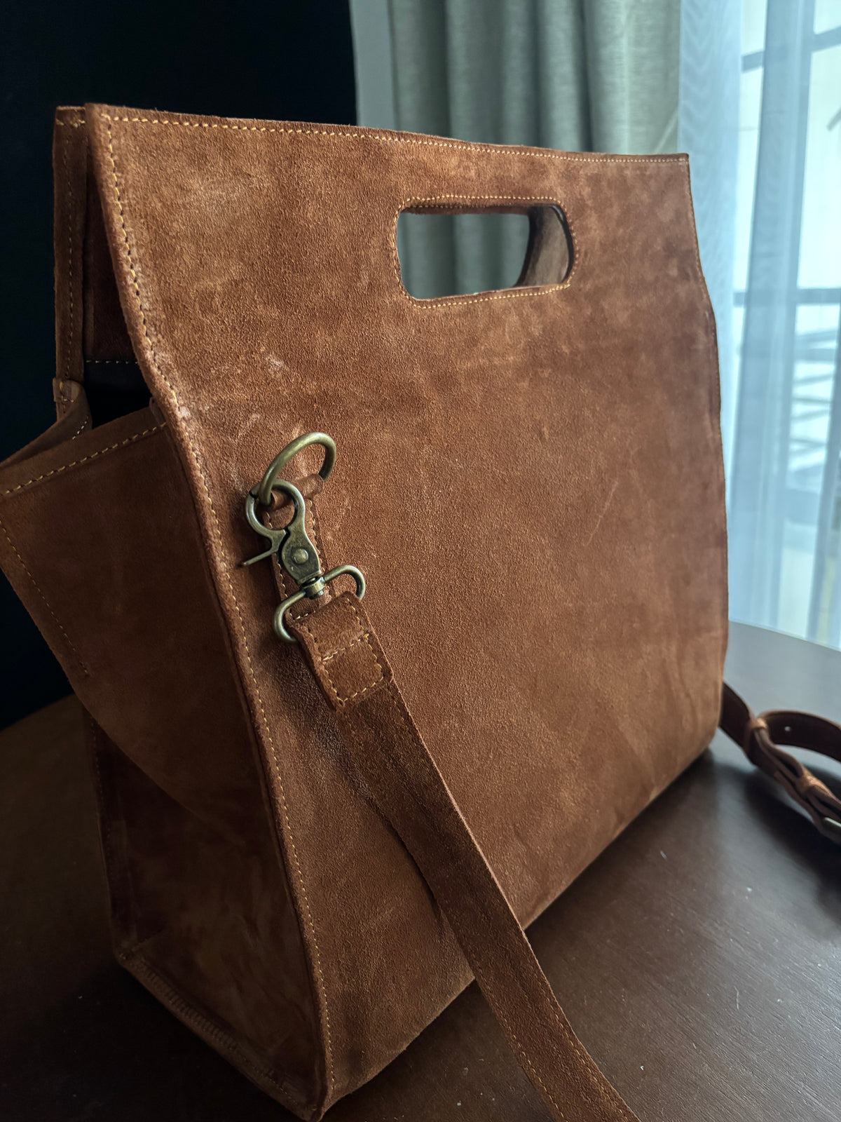 A Brown Suede Satchel Bag